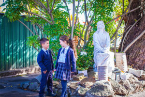 01-belfield-out-history-statue